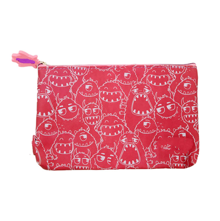 Estuche para lápices de piel con cara de monstruo estampado